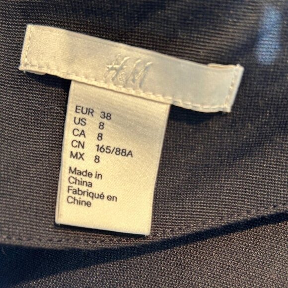 H&M Black Peplum Dress – Structured Fit, Soft Stretch Fabric, Layered Hem, Back - Picture 5 of 6